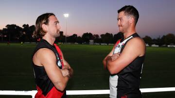 Marrar assistant coach Zach Walgers and North Wagga vice captain Ky Hanlon ahead of the clash between the Saints and Bombers on Thursday night. Picture by Tom Dennis