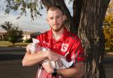Temora winger Joel Kelly returned to the field this season, pictured with daughter Daisy Kelly (five weeks). Picture by Tom Dennis