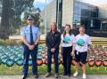 Ben Smith, Joanne Cheshire, Kia Leighton-Popple and Trish Suckling were raising awareness about road safety and incident prevention outside Wagga Civic Centre on May 8 for National Road Safety Week 2024. Picture by Emily Anderson